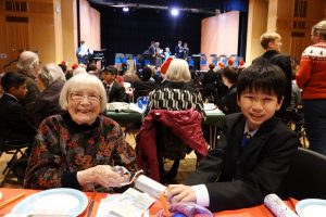 Local resident and student enjoy Trinity Community Christmas Party