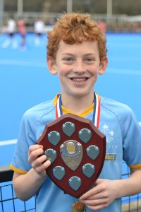 Trinity U13s Hockey champions