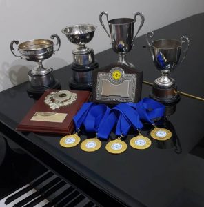 Zain Lam's trophies from the Bromley Music Festival